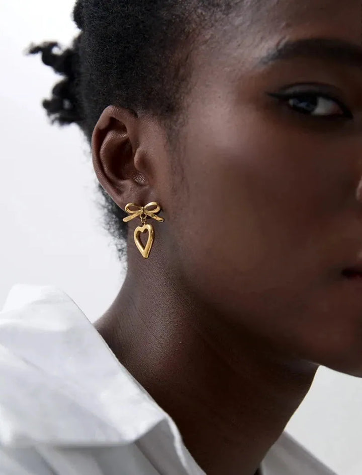 Gold plated bow tie heart drop earrings