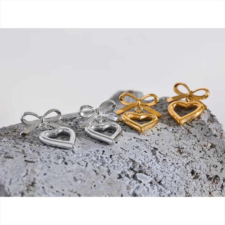 Gold plated bow tie heart drop earrings