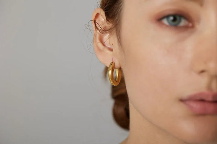 Gold plated elegant hinge back earrings