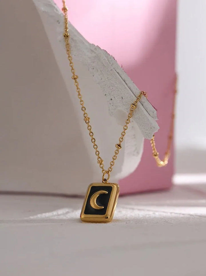 Gold plated enamel moon pendant necklace