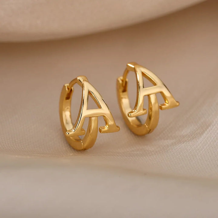 Gold plated initial letter huggie earrings