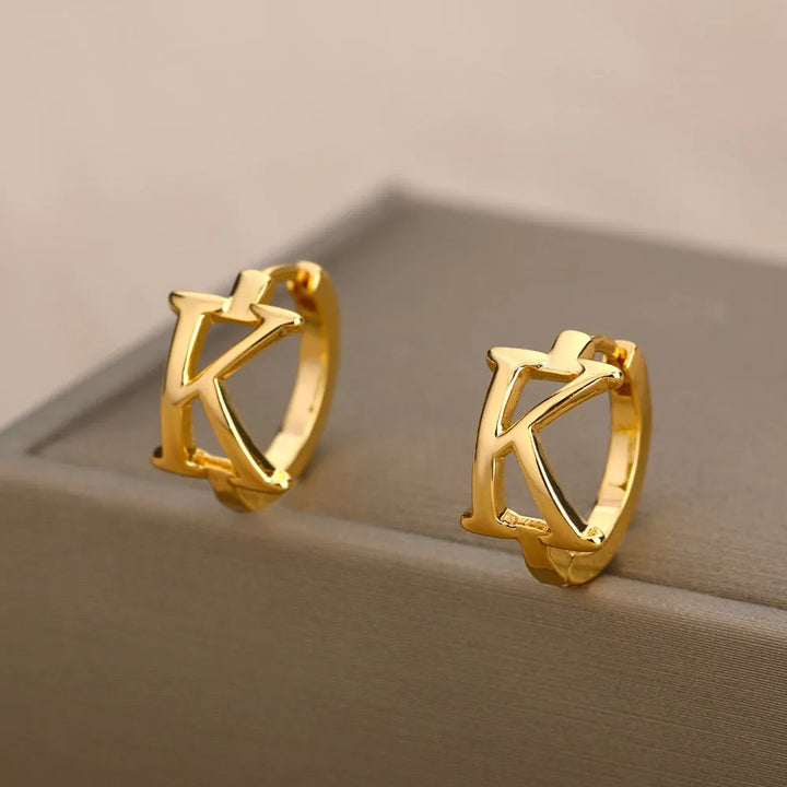 Gold plated initial letter huggie earrings