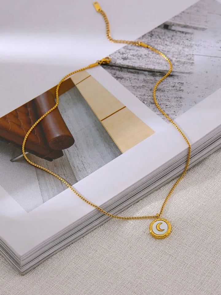 Gold plated moon natural shell necklace