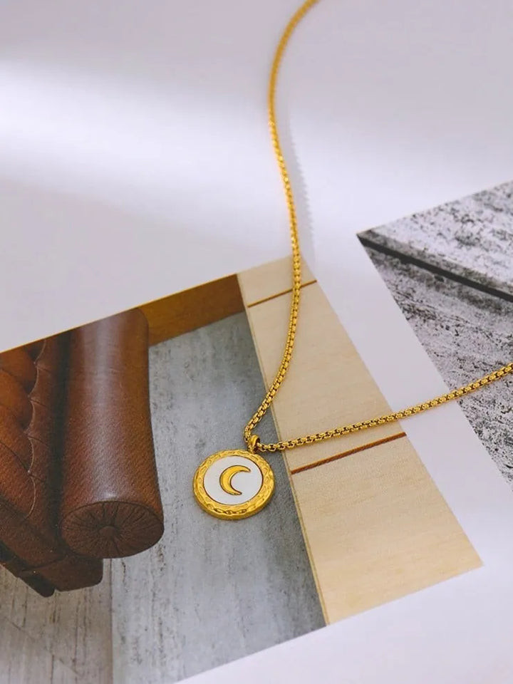 Gold plated moon natural shell necklace