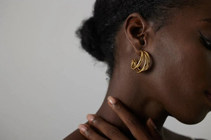 Gold plated statement triple hollowed earrings