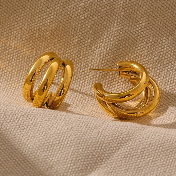 Gold plated statement triple hollowed earrings