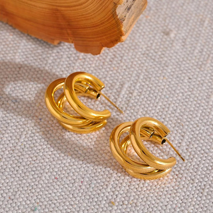 Gold plated statement triple hollowed earrings