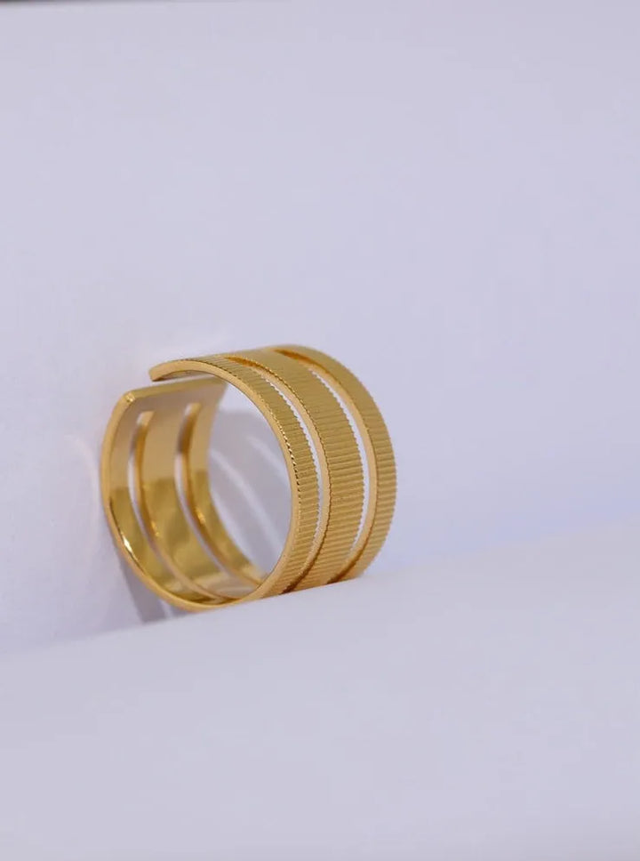 Gold plated textured open triple ring