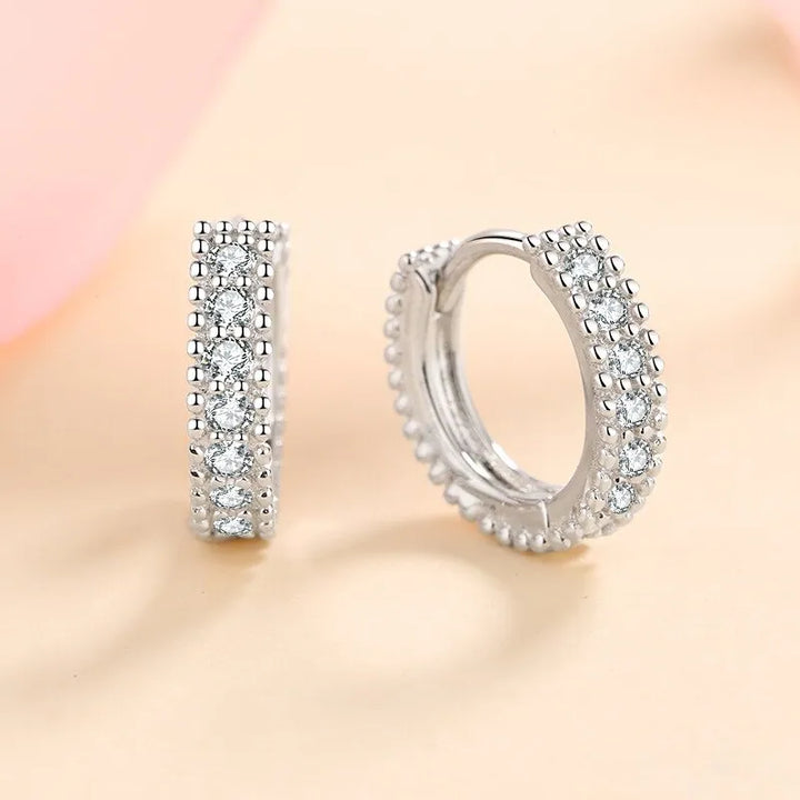 Sterling silver paved moissanite hoop earrings