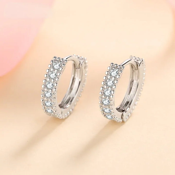 Sterling silver paved moissanite hoop earrings