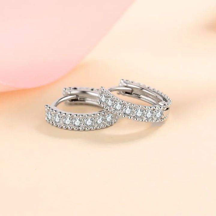 Sterling silver paved moissanite hoop earrings