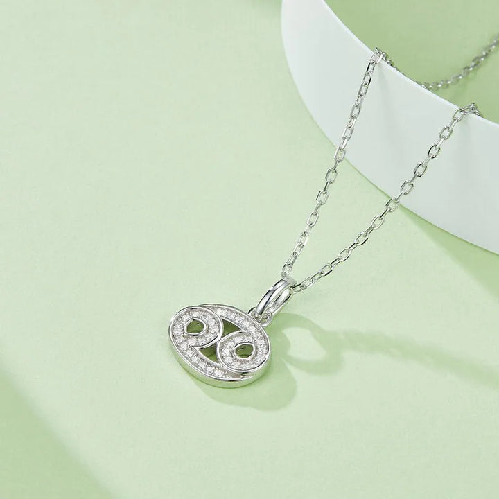 Sterling silver zodiac symbol paved moissanite necklace