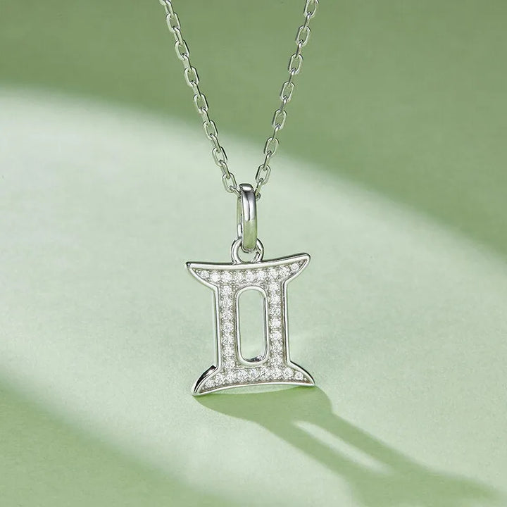 Sterling silver zodiac symbol paved moissanite necklace